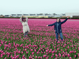 Miaomiao and Lea in a field with purple tulips near the Heereweg street at Lisse