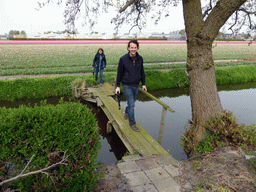 Benjamin and lea on a wooden bridge from one flower field to another near the Heereweg street at Lisse