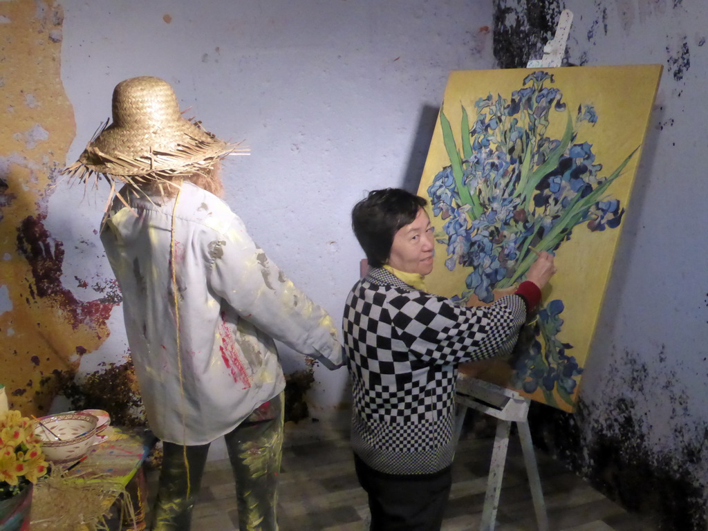 Miaomiao`s mother with a Vincent van Gogh painting in the Oranje Nassau pavilion at the Keukenhof park