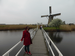Miaomiao at the bridge leading to the Museum Windmill Nederwaard