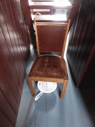 Chair and chamber pot at the middle floor of the Museum Windmill Nederwaard