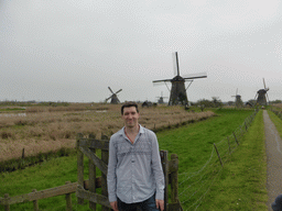 Tim with the Nederwaard and Overwaard windmills, viewed from the southeast side of the Museum Windmill Nederwaard