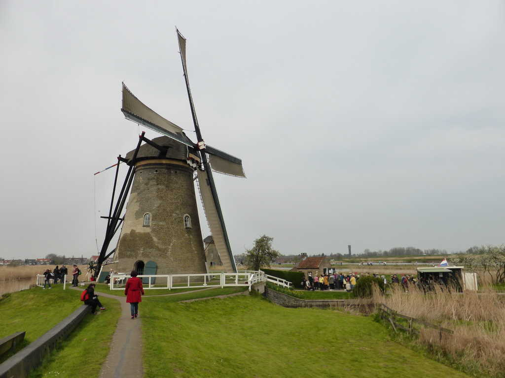 Miaomiao in front of the left side of the Museum Windmill Nederwaard