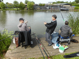 Miaomiao`s father with fishermen at the Molenkade Nederwaard street