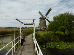 Miaomiao`s mother at the bridge leading to the Museum Windmill Nederwaard