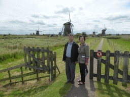 Miaomiao`s parents with the Nederwaard and Overwaard windmills, viewed from the southeast side of the Museum Windmill Nederwaard