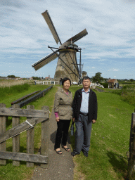 Miaomiao`s parents with the southeast side of the Museum Windmill Nederwaard