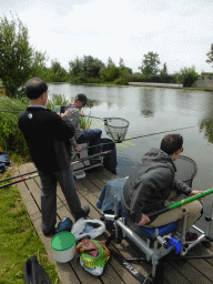 Miaomiao`s father with fishermen at the Molenkade Nederwaard street