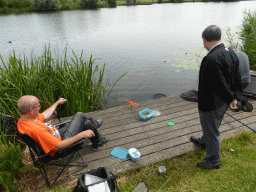 Miaomiao`s father with fishermen at the Molenkade Nederwaard street