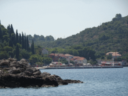 The Rt. Ratac point at the north side of the Kolocep island, Kolocep Bay and boats at the Kolocep Harbour, viewed from the Elaphiti Islands tour boat