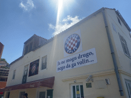 Hajduk Split logo on the facade of the post office at the Donje Celo street