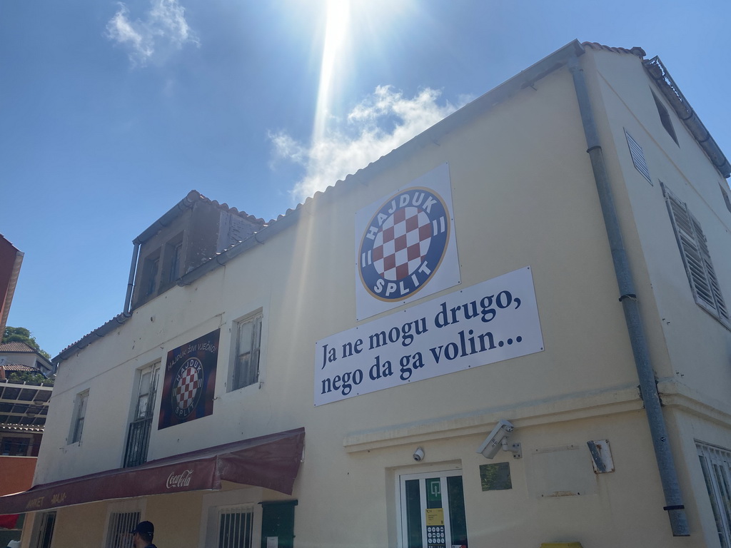 Hajduk Split logo on the facade of the post office at the Donje Celo street