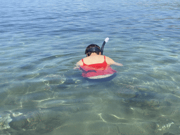 Miaomiao with goggles and snorkel at the Donje Celo Beach
