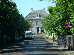 The Voorstraat street and the front of the Schelde restaurant at Colijnsplaat, viewed from the car