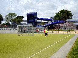 Playground and slide at the outside of the swimming pool at Camping and Villa Park De Paardekreek