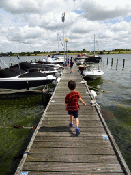Max and his friends catching crabs on a pier at Camping and Villa Park De Paardekreek