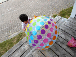 Max with a beach ball at Camping and Villa Park De Paardekreek