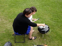 Miaomiao and Max doing barbecue at Camping and Villa Park De Paardekreek