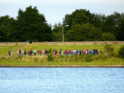 People at the south side of the Veerse Meer lake, viewed from the Camping and Villa Park De Paardekreek