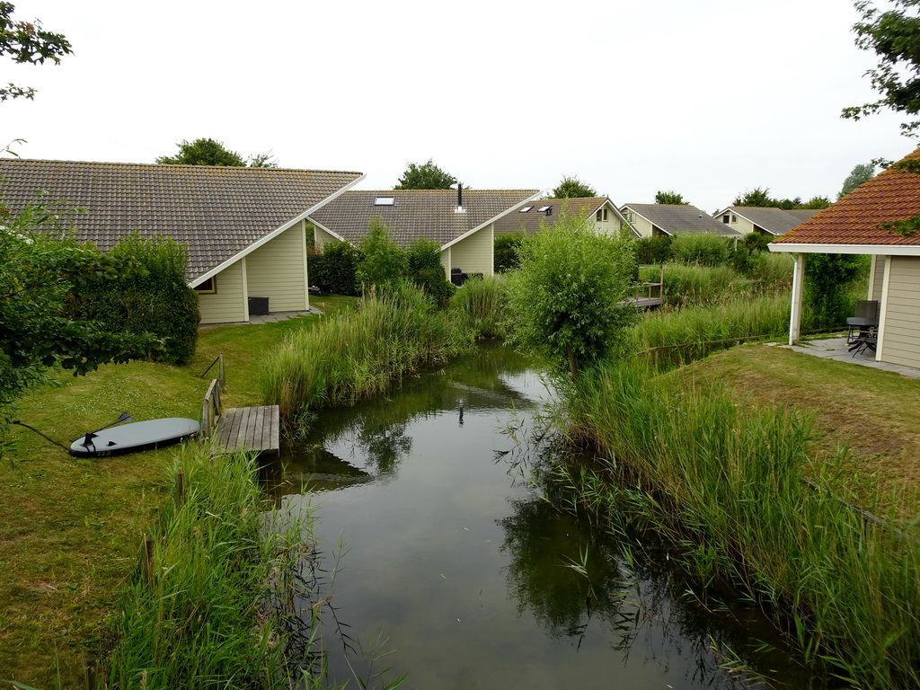 Villas and stream at Camping and Villa Park De Paardekreek