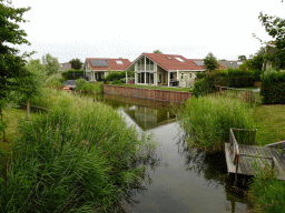 Villas and stream at Camping and Villa Park De Paardekreek