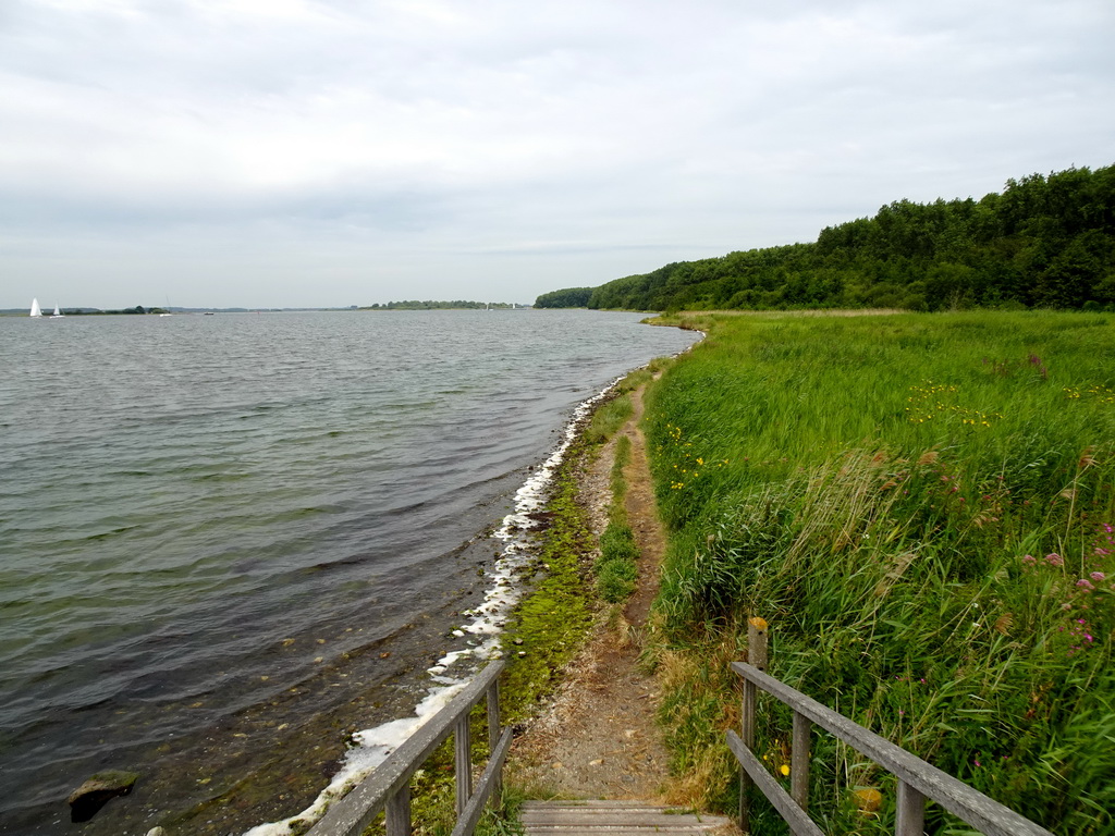 The Veerse Meer lake and a grassland, viewed from a bridge at Camping and Villa Park De Paardekreek
