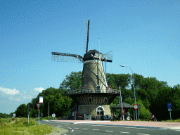 The Korenbloem windmill, viewed from the car on the Kortgeenseweg street