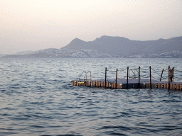 The Aegean Sea and the Bodrum Peninsula in Turkey, viewed from the beach of the Blue Lagoon Resort, at sunset