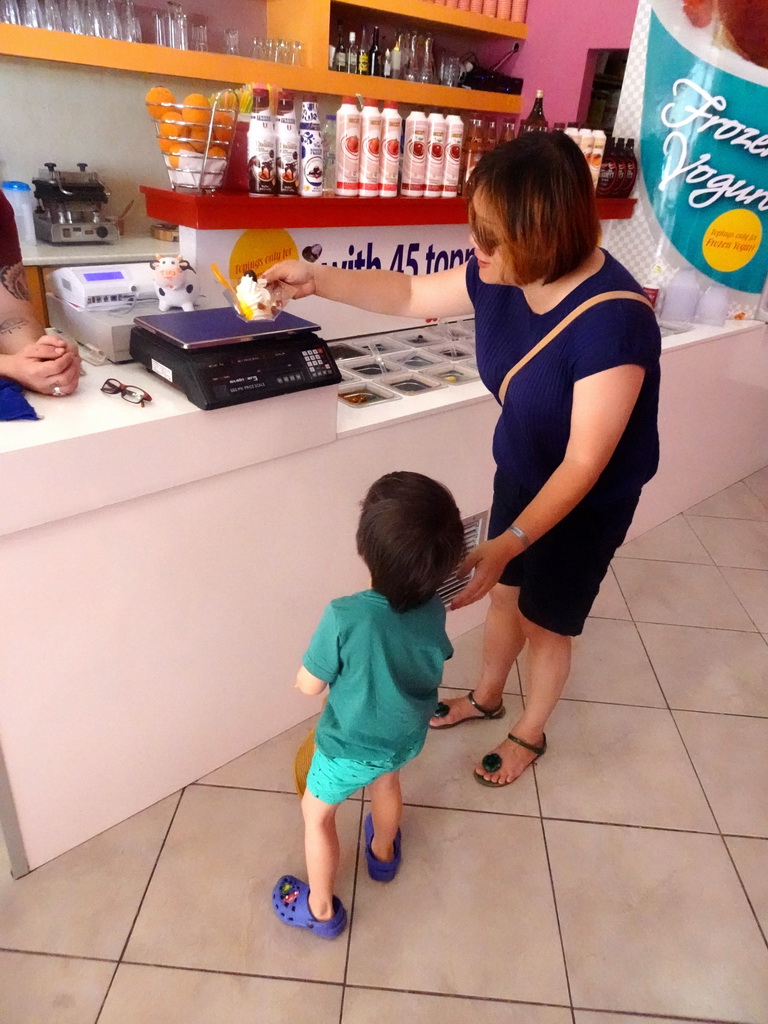 Miaomiao and Max with an ice cream at the Floor Café at the 25is Martiou street