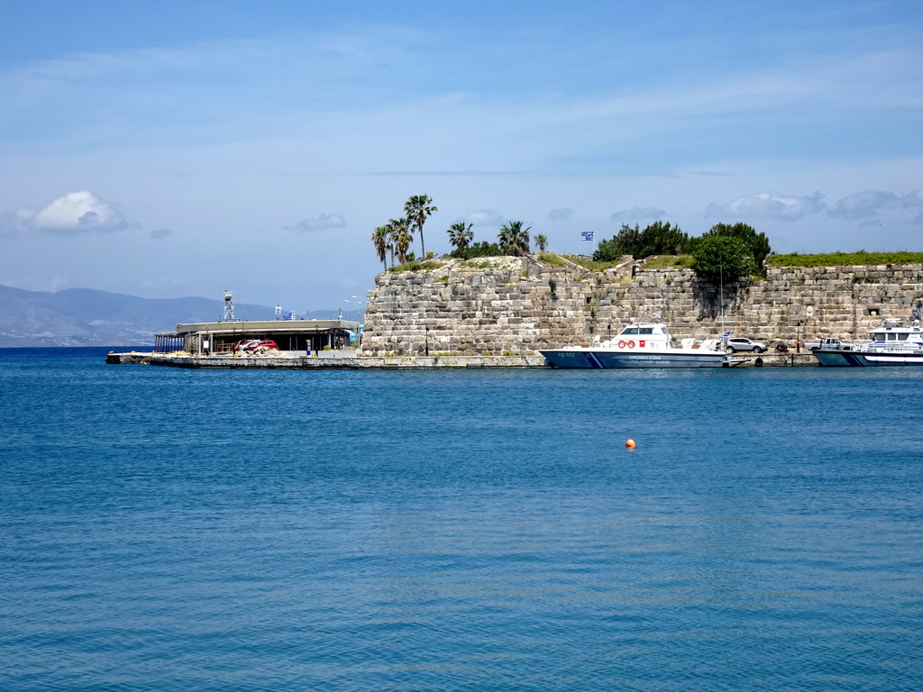 Boats in the Limenas Ko harbour and Neratzia Castle, viewed from the Akti Kountouriotou street