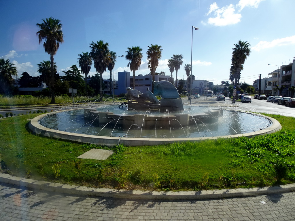 Fountain at the roundabout on the east end of the Asklipioy street, viewed from the tour bus
