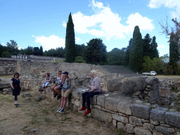 Our tour guide and ruins at the lower level of the Asclepeion