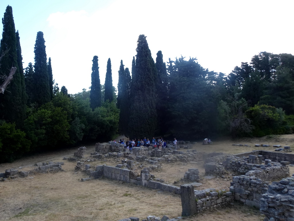 Group of tourists at the lower level of the Asclepeion, viewed from the First Terrace