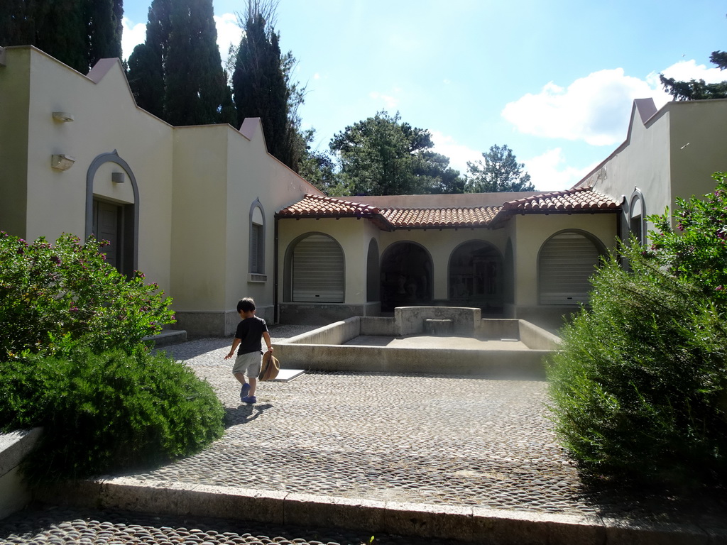 Max in front of a house on the east side of the Asclepeion