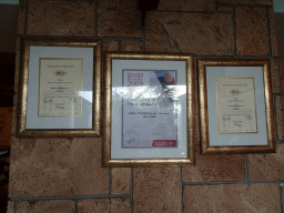 Certificates on the wall of the Triantafyllopoulos Winery