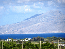 Trees, houses, the Aegean Sea and the island of Kalymnos, viewed from the Triantafyllopoulos Winery