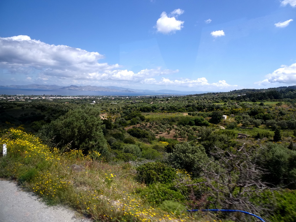 Hills at the north side of the town of Zia, viewed from the tour bus on the Miniera Asfendiou street