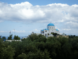 The Holy Church of the Birth of the Virgin Mary at the north side of the town of Zia, viewed from the tour bus on the Miniera Asfendiou street