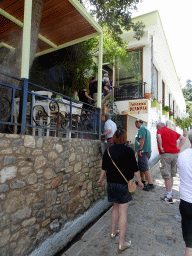 Miaomiao in front of the Taverna Olympia restaurant at the town of Zia