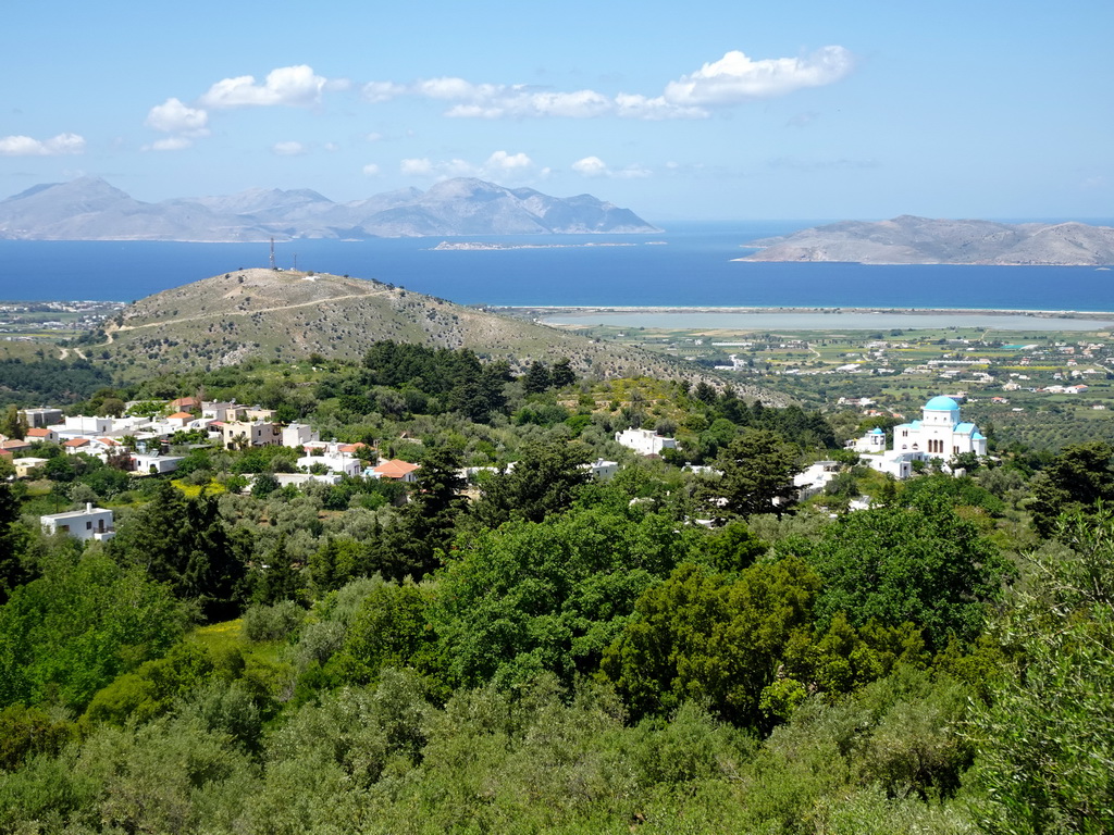 The Holy Church of the Birth of the Virgin Mary, the north side of the island, the Aegean Sea and the islands of Kalymnos and Pserimos, viewed from the viewing point at the north side of the town of Zia