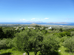 The Holy Church of the Birth of the Virgin Mary, the north side of the island, the Aegean Sea and the islands of Kalymnos and Pserimos, viewed from the viewing point at the north side of the town of Zia