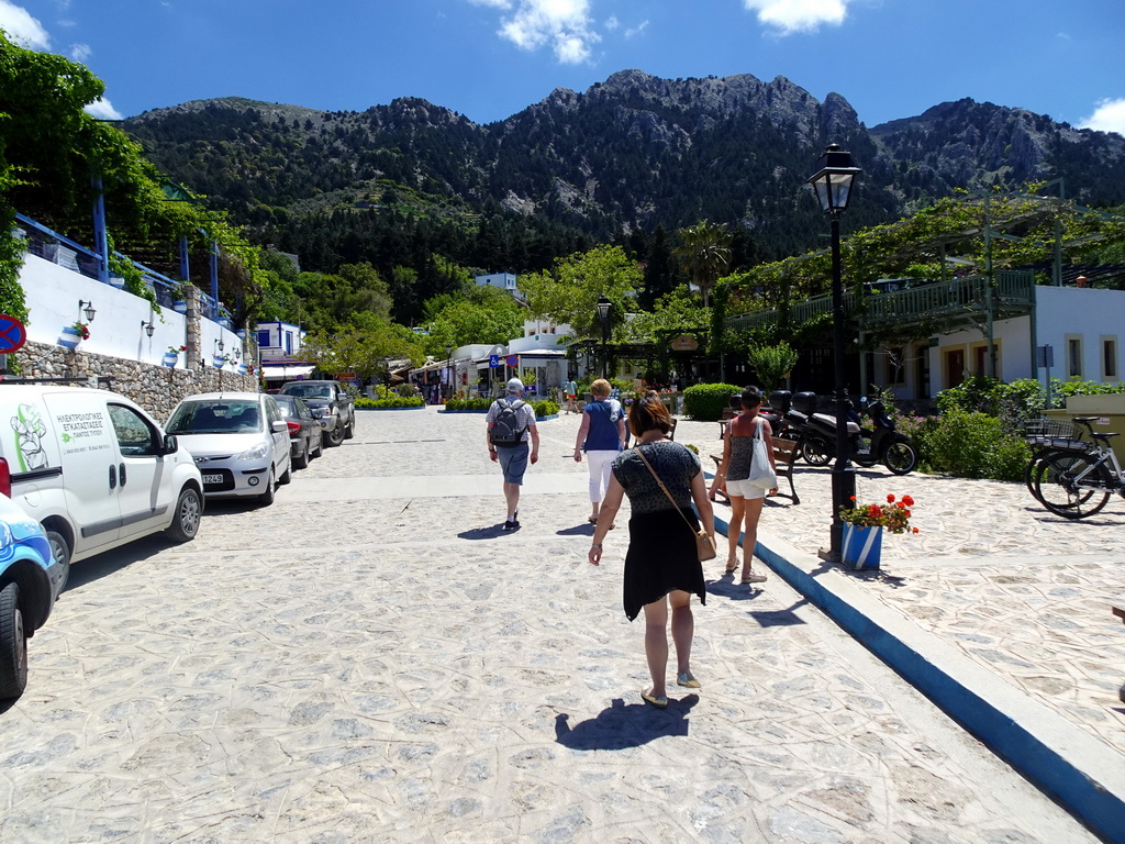 Miaomiao at the main street of the town of Zia and Mount Dikeos