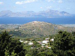 The north side of the island, the Aegean Sea and the island of Kalymnos, viewed from the Sunset Balcony Tavern at the town of Zia