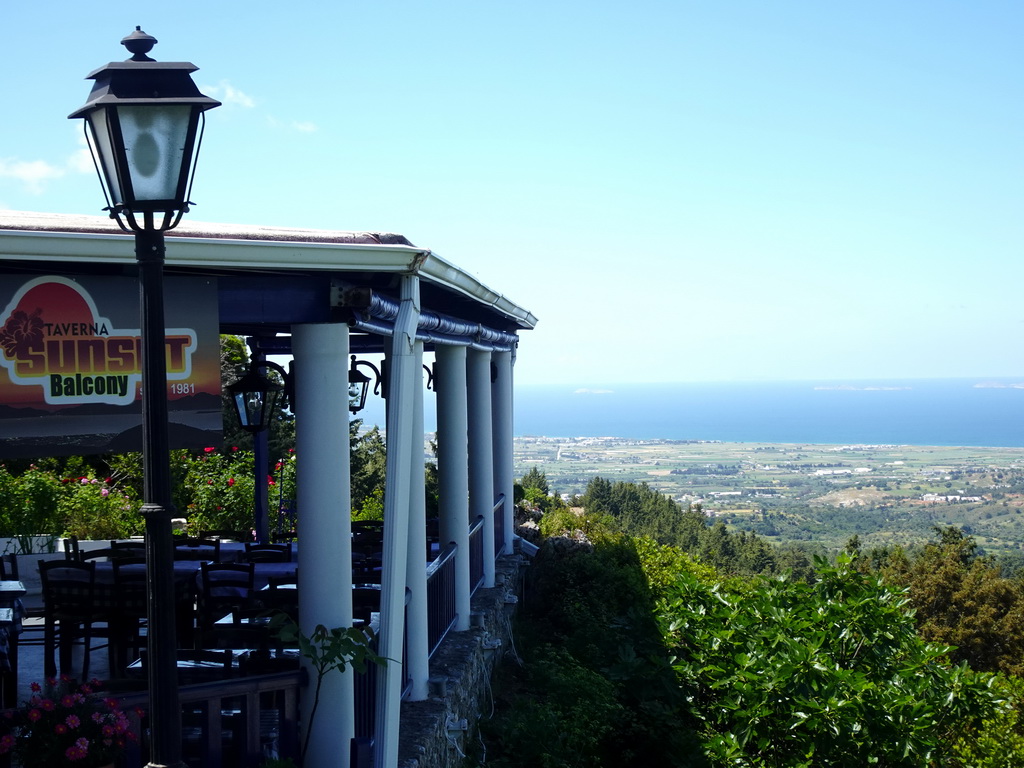 The Sunset Balcony Tavern at the town of Zia, with a view on the Aegean Sea and the north side of the island