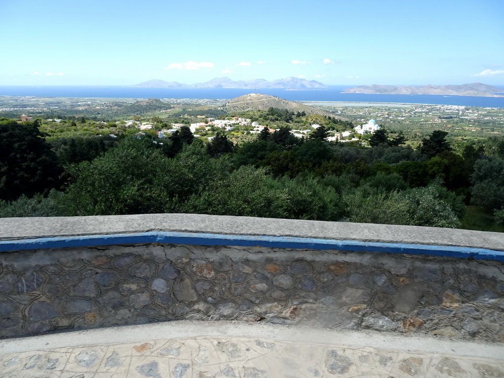 The viewing point at the north side of the town of Zia, the Holy Church of the Birth of the Virgin Mary, the north side of the island, the Aegean Sea and the islands of Kalymnos and Pserimos, viewed from the tour bus