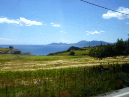 The northwest side of the island, the Aegean Sea and the island of Kalymnos, viewed from the tour bus on the Eparchiakis Odou Ko-Kefalou street