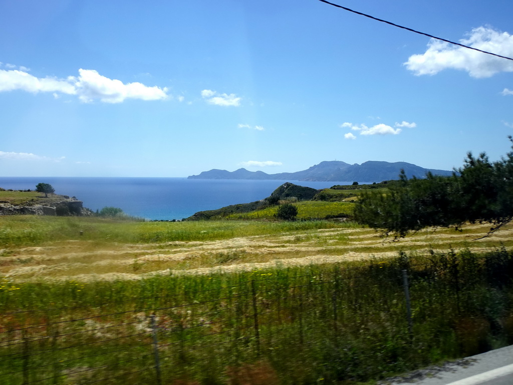 The northwest side of the island, the Aegean Sea and the island of Kalymnos, viewed from the tour bus on the Eparchiakis Odou Ko-Kefalou street