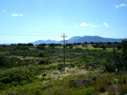 The northwest side of the island, the Aegean Sea and the island of Kalymnos, viewed from the tour bus on the Eparchiakis Odou Ko-Kefalou street