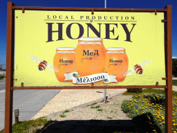 Sign in front of the Melissa Honey Farm at the east side of the town of Kefalos