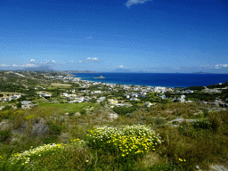 The town of Kefalos, the Aegean Sea, the island of Palaiokastro and Mount Dikeos, viewed from the tour bus